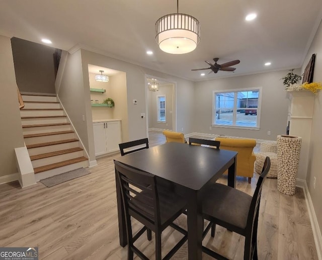 319 S Madison Ave, Monroe, GA 30655 - dining area with baseboards, light wood-style flooring, ceiling fan, stairs, and recessed lighting