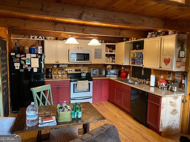 kitchen with hanging light fixtures, black appliances, sink, wooden ceiling, and beamed ceiling