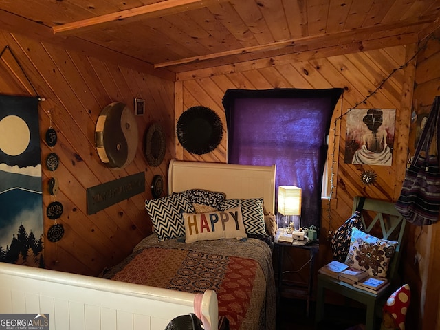 bedroom with wood walls and wooden ceiling