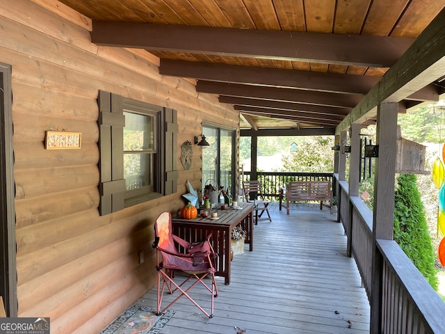 wooden terrace with covered porch