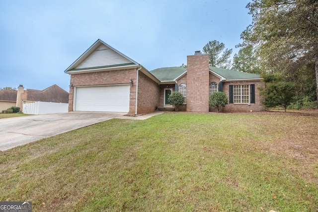 ranch-style house with a garage and a front lawn