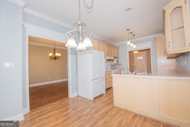 kitchen featuring light brown cabinets, white appliances, crown molding, and light hardwood / wood-style floors