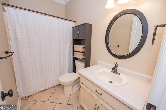 bathroom featuring toilet, tile patterned flooring, vanity, crown molding, and walk in shower