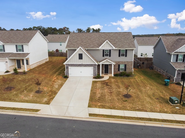 view of front facade featuring a front lawn and a garage