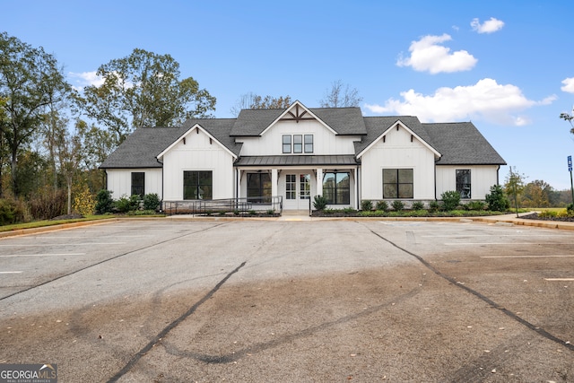 modern farmhouse style home with a porch