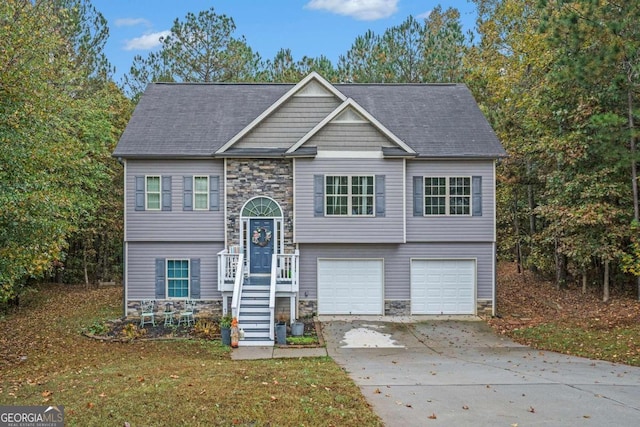 split foyer home featuring a garage