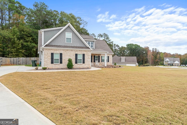 craftsman-style home featuring a front yard