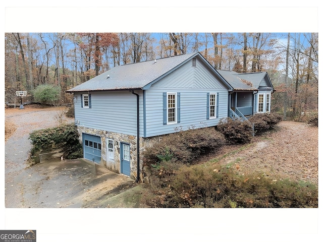 view of home's exterior featuring a garage