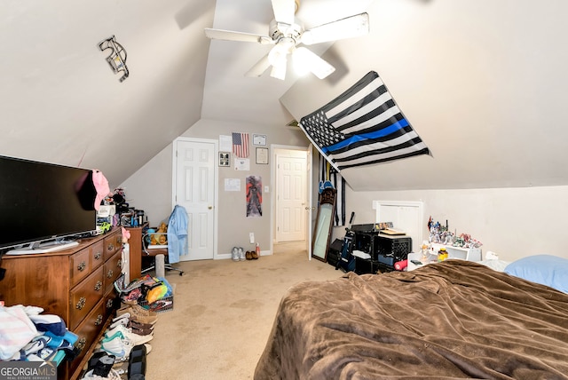 carpeted bedroom featuring vaulted ceiling and ceiling fan