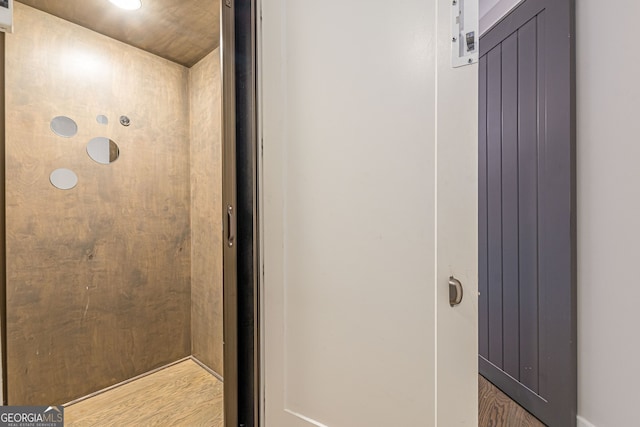 bathroom featuring hardwood / wood-style floors