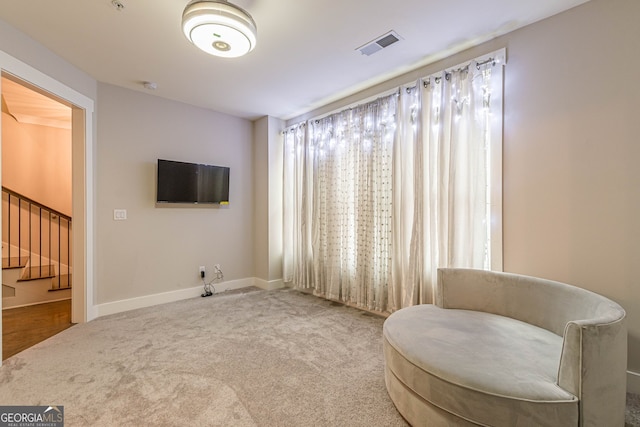 living area with carpet floors