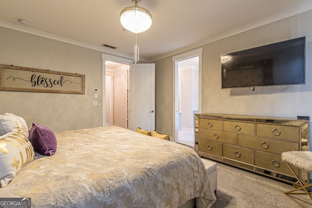 carpeted bedroom with ornamental molding