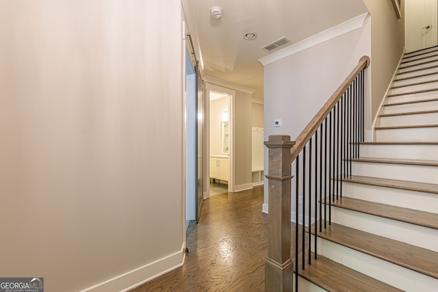 stairs with hardwood / wood-style flooring