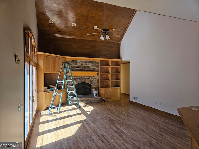 unfurnished living room featuring high vaulted ceiling, plenty of natural light, hardwood / wood-style flooring, and ceiling fan