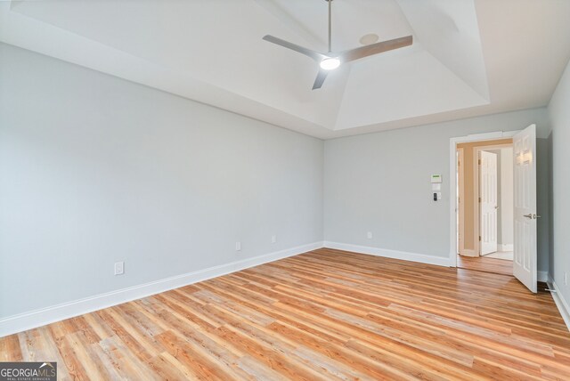 entrance foyer with wood-type flooring and a chandelier