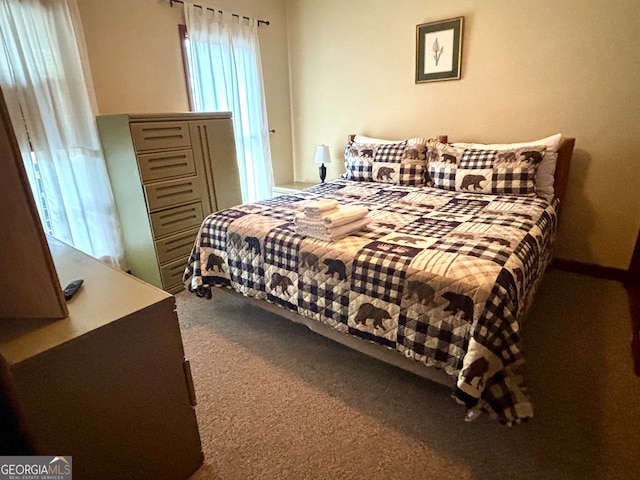 bedroom featuring carpet flooring