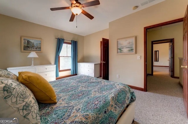 carpeted bedroom with ceiling fan