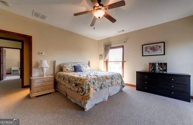 bedroom with ceiling fan and carpet floors