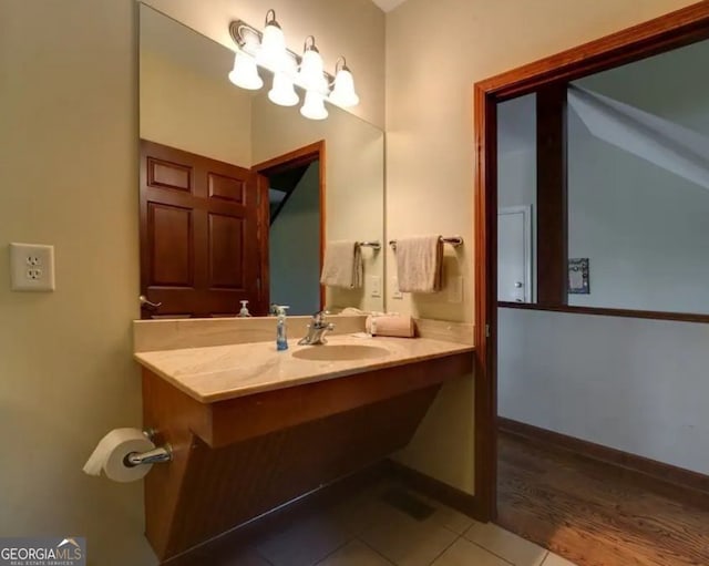 bathroom featuring vanity and tile patterned flooring