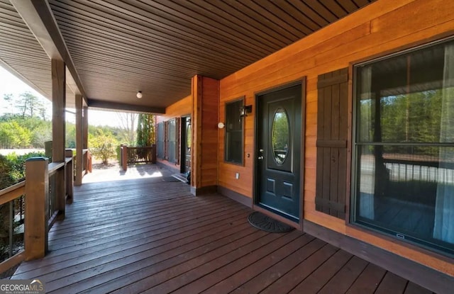 deck featuring covered porch