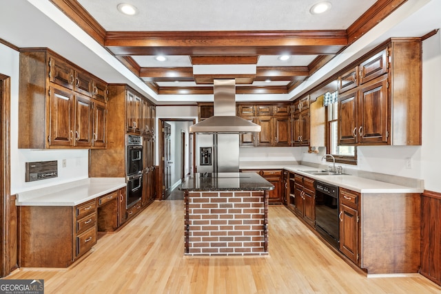 kitchen with island range hood, a kitchen island, coffered ceiling, and light hardwood / wood-style floors