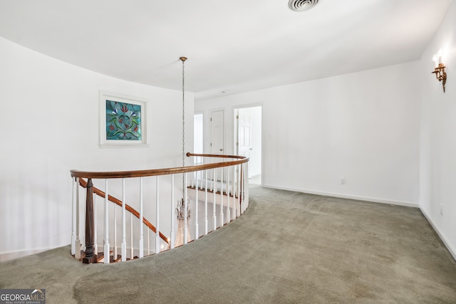 hall featuring carpet floors