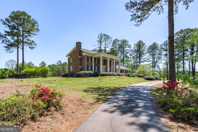 view of front of home with a front lawn