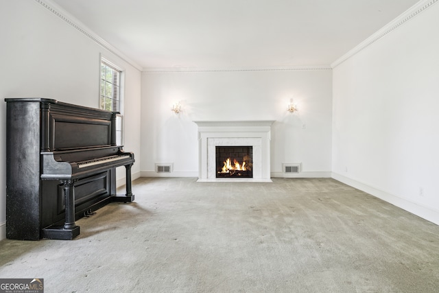 unfurnished living room featuring a premium fireplace, light carpet, and crown molding