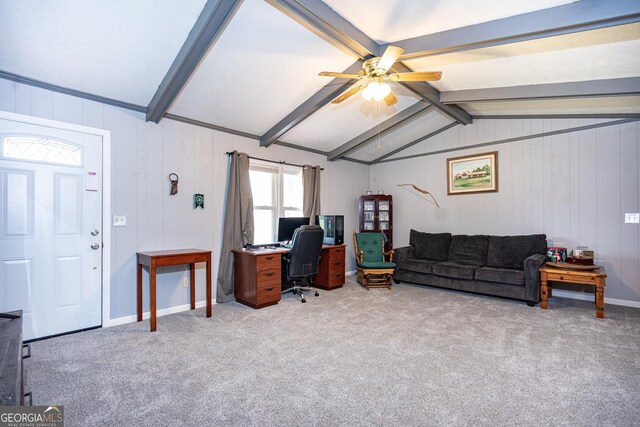 carpeted office with ceiling fan and lofted ceiling with beams