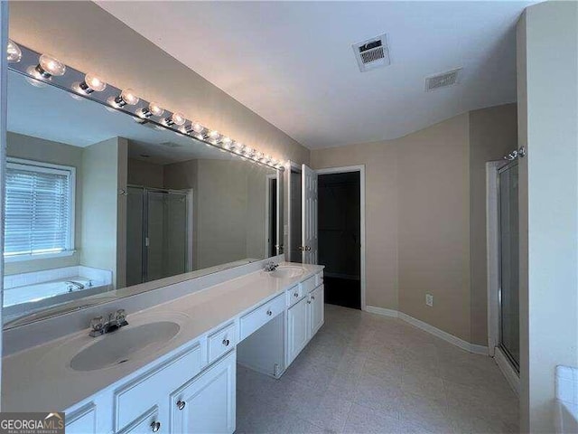 bathroom with shower with separate bathtub and vanity