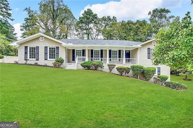 single story home with a porch and a front yard