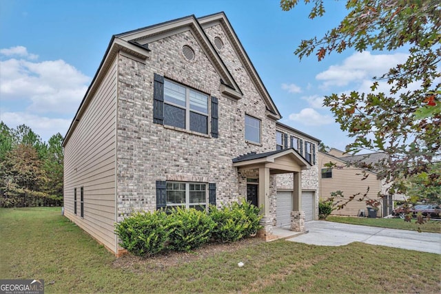 view of front of home featuring a front lawn and a garage