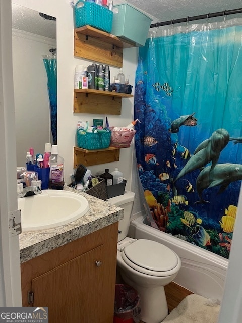 full bathroom featuring a textured ceiling, shower / bath combo with shower curtain, wood-type flooring, vanity, and toilet