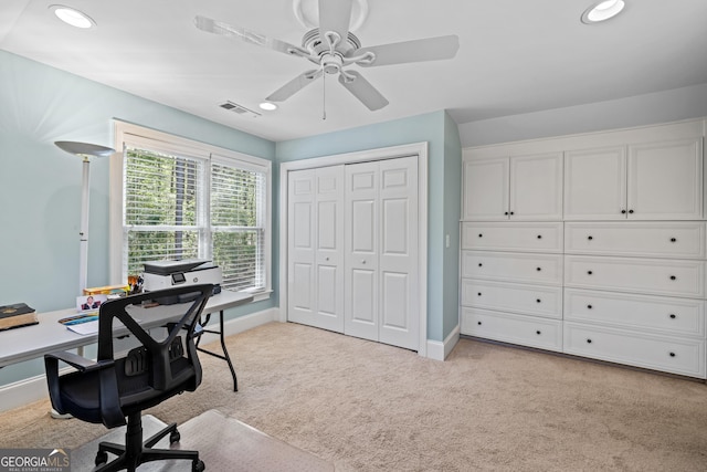 office featuring light colored carpet and ceiling fan