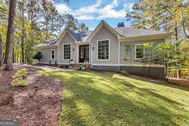 single story home with a front yard