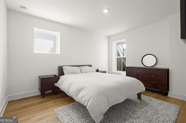 bedroom featuring light wood-type flooring