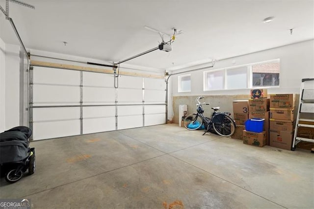 garage featuring a garage door opener