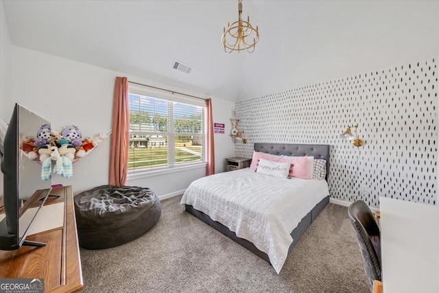 carpeted bedroom with lofted ceiling