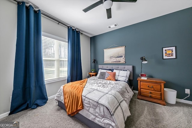 carpeted bedroom featuring ceiling fan