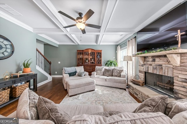 living room with a fireplace, coffered ceiling, hardwood / wood-style floors, beamed ceiling, and ceiling fan