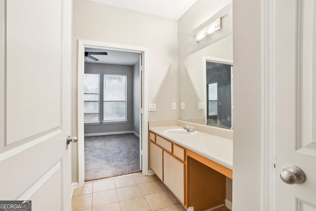 bathroom with tile patterned flooring and vanity