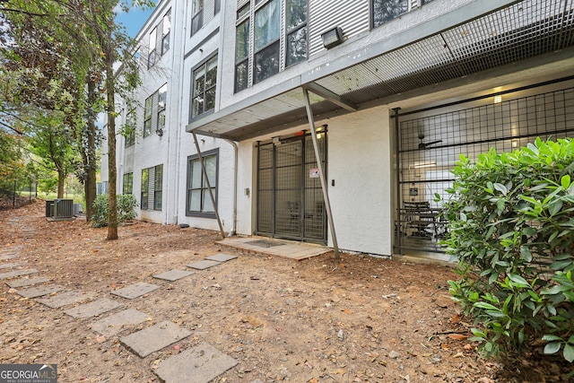 entrance to property featuring central AC