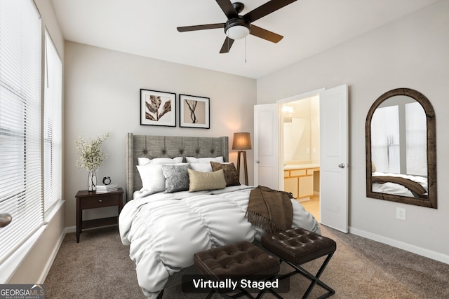 carpeted bedroom with connected bathroom and ceiling fan