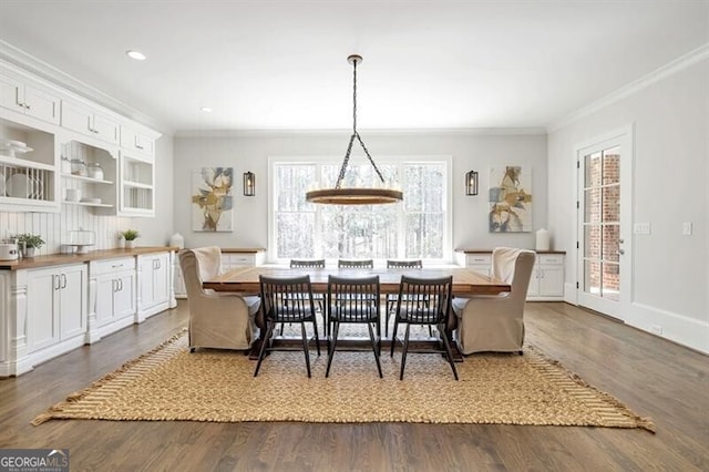 885 Crabapple Hl, Milton, GA 30004 - dining area featuring crown molding and dark wood-type flooring