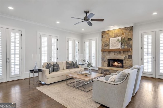 885 Crabapple Hl, Milton, GA 30004 - living room with french doors, a fireplace, crown molding, and hardwood / wood-style flooring