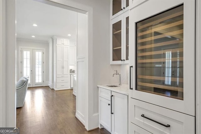 885 Crabapple Hl, Milton, GA 30004 - bar featuring sink, white cabinets, wine cooler, dark wood-type flooring, and french doors