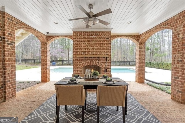 885 Crabapple Hl, Milton, GA 30004 - view of patio featuring an outdoor brick fireplace, a fenced in pool, and ceiling fan