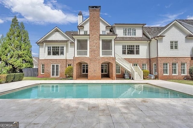885 Crabapple Hl, Milton, GA 30004 - back of house with a patio
