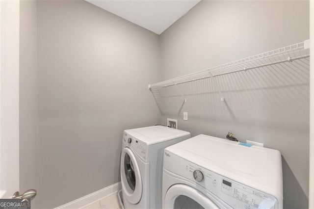 washroom with washer and clothes dryer