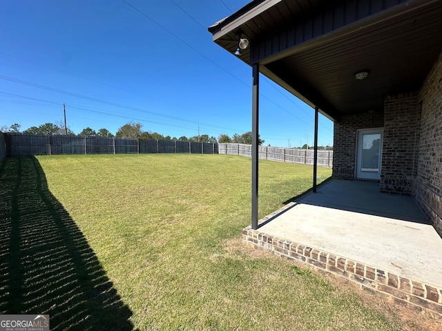 view of yard with a patio area